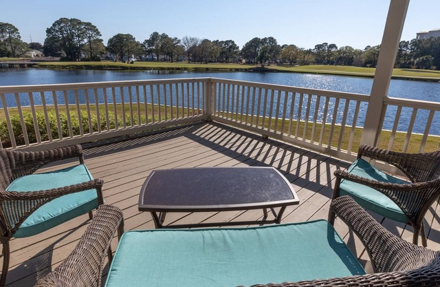 Coastal Charm with Lake and Golf Course View, Pool, Tram to Beach and Wharf.