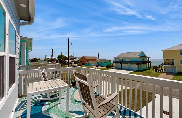 Coastal home with stunning view of the bay and outdoor cooking area