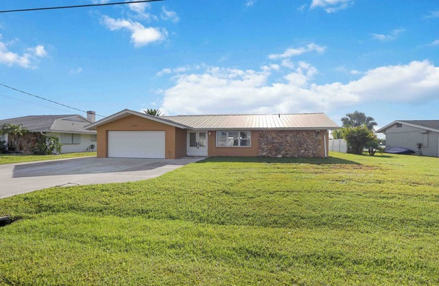 Coastal Luxury awaits in this 3/3 on the River