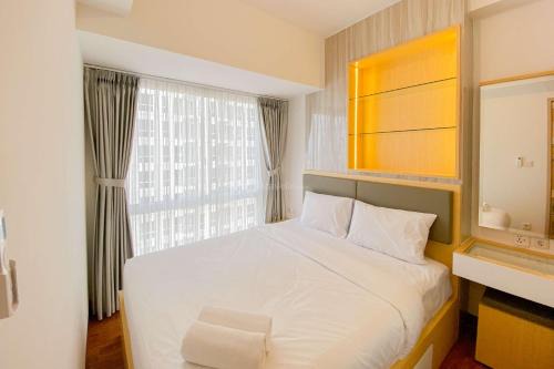Combined and Comfort Stay 2BR Tokyo Riverside PIK 2 Apartment By Travelio