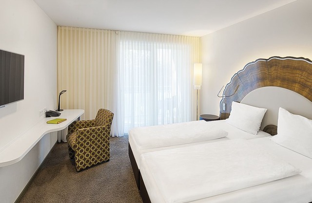 Comfort double room with balcony - TAOme - Feng Shui Stadhotel Breisgau