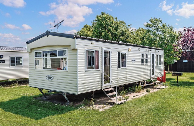Comfortable 12ft-wide caravan with one double and two twin.