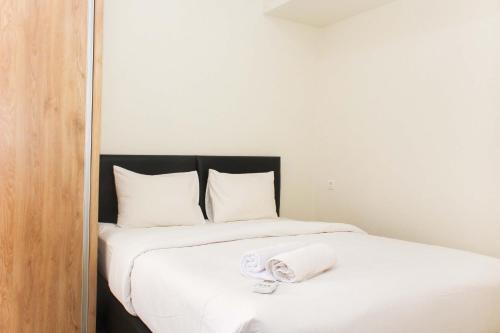 Comfortable 2BR Apartment at Mustika Golf Residence By Travelio