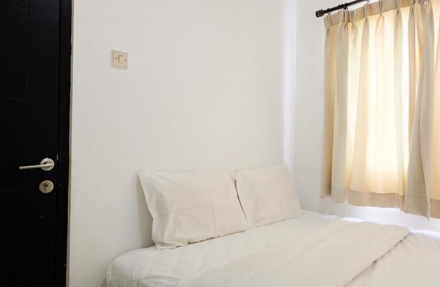 Comfortable 2BR Apartment at Paragon Village By Travelio