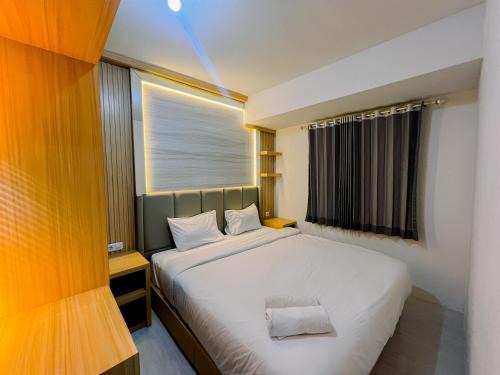 Compact and Relaxing 2BR at Suncity Residence Apartment By Travelio