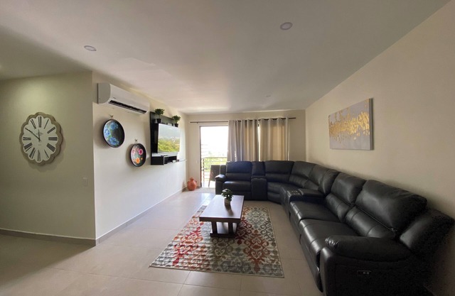 Condo In El Salvador, with a King-size bed.