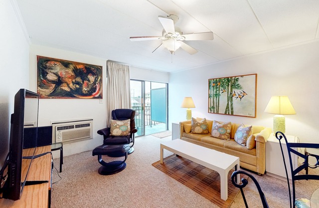 Condo Steps from the Beach w/Balcony, Partial Ocean View, AC & Shared Pool