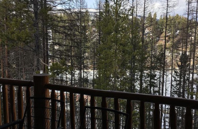 Condo with a mountain view from private hot tub at the base of the ski hill
