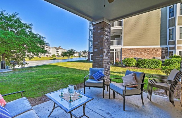 Condo with Patio and Pool Access about 2 Miles to Beaches