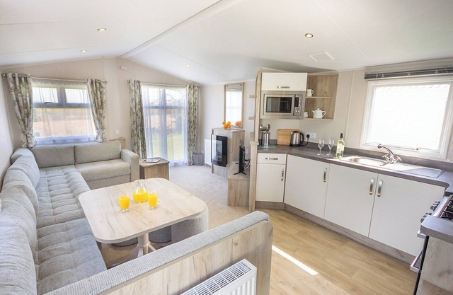 Contemporary caravan with one double and one twin.