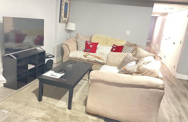 Contemporary two bedrooms lower level guest suite with luxury hot tub