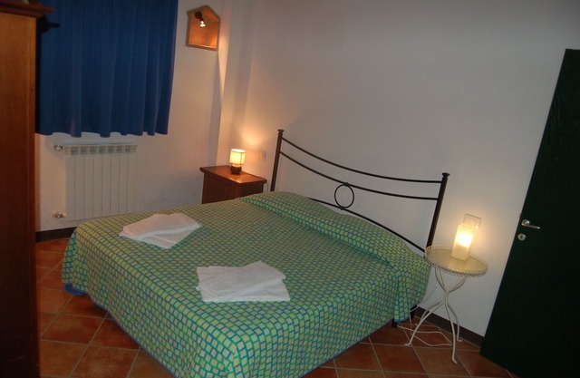 Cosy apartment with WIFI, pool, TV, patio, pets allowed and parking, close to San Gimignano