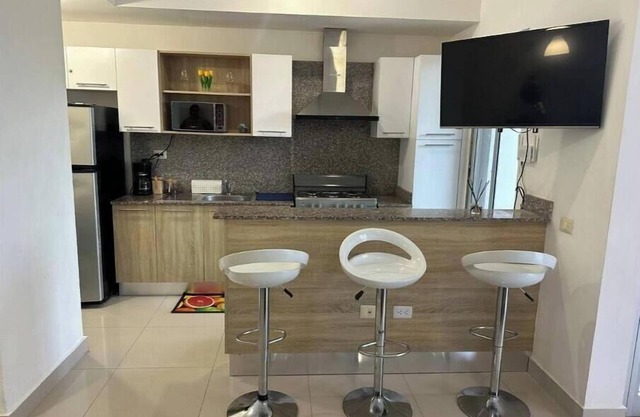 Cozy 2-bedroom condo with WiFi, fitness room and pool in tranquil Boca Chica