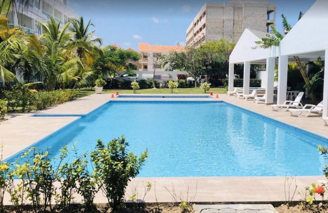 Cozy 2-Bedroom Condo with 2 pools by the beach