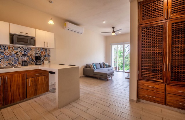 Cozy condo with pool walking distance to amenities