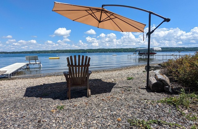Cozy cottage right on Skaneateles Lake, and minutes from the village.