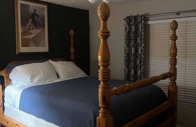 cozy getaway with hot tub, sits on a relaxing patio, close freeway access