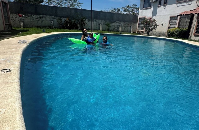 "Cozy house with pool and amenities.