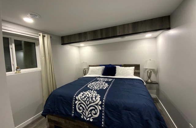 Cozy Modern 1 Bedroom Basement Suite with Fireplace, AC, & Seperate Entrance