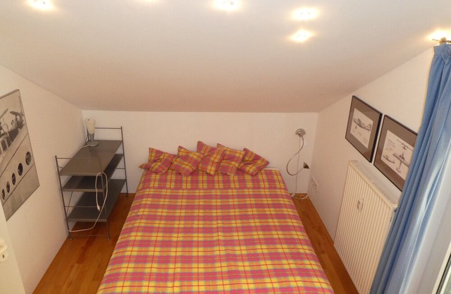 Cozy, top-equipped attic studio with panoramic terrace