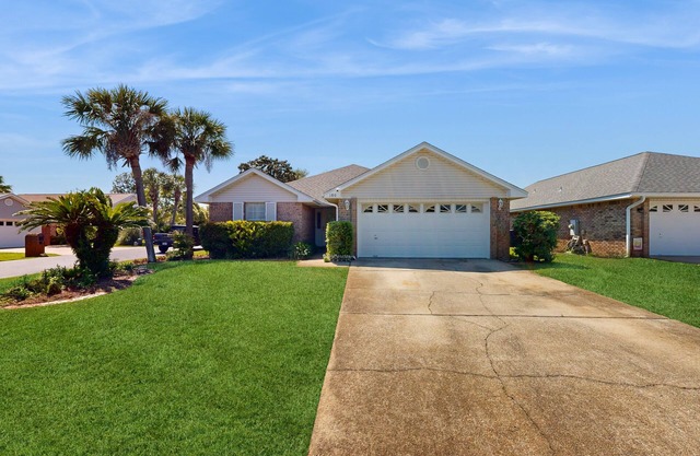 Darling home near the beach with pool, deeded beach access, patio, W/D, & AC