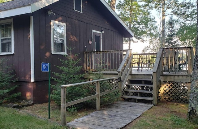Delightful lakeside cottage on Little Saint Germain with private dock and sandy