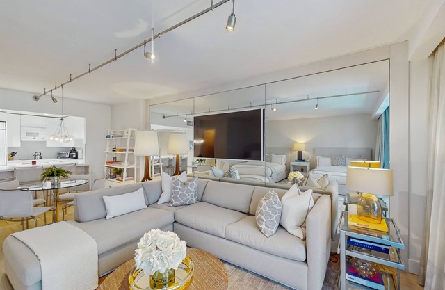 Deluxe beachfront condo with ocean views, pools, spas, gym, & valet parking
