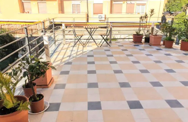 DESIGN STUDIO WITH TILES TERRACE
