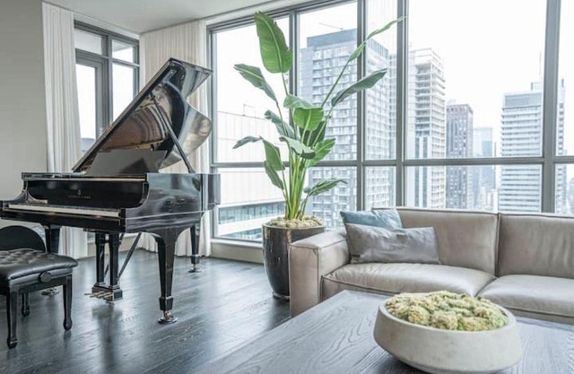 Designer Penthouse with Grand Piano & Lake Views