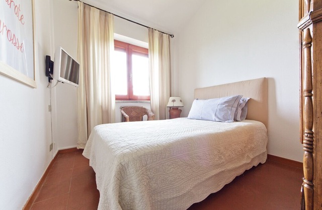 Designer villa with splendid bay view of Punta Ala, two terraces and garden.