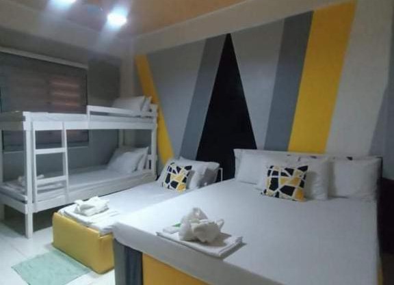 DJCI Apartelle Walk to Robinson & NE Pacific Mall 3 Min to SM Cabanatuan