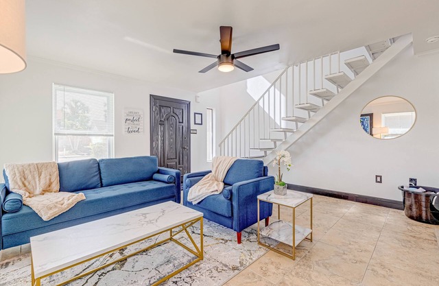 Dog-friendly duplex with fenced yard, private outdoor living, AC, & washer/dryer