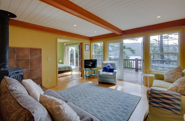Dog-friendly home with deck, firepit & sound views