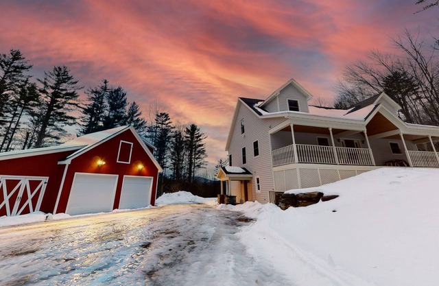 Dog-friendly house near skiing with mountain view, game room, fireplace, & grill