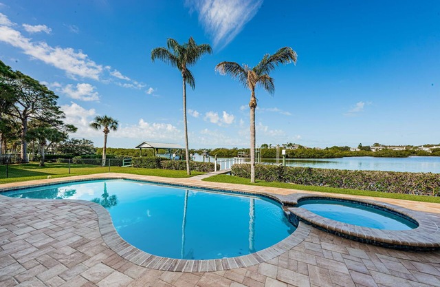 Dolphins in your backyard! Peaceful waterfront oasis w/sparkling pool & hottub.