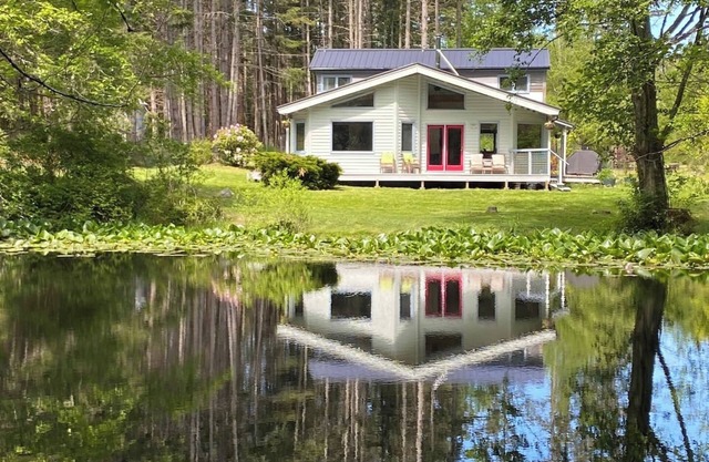 Dragonfly Pond house is a rustic, spacious, light-filled vacation rental home on Orcas Island with high ceilings overlooking a tranquil pond. Clean & comfy. Located in 7 acres of forest, it's peaceful and secluded. Close to town and the ferry.