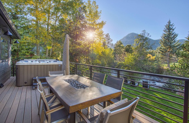 Dreamy home on river, mountain views, steps from town.