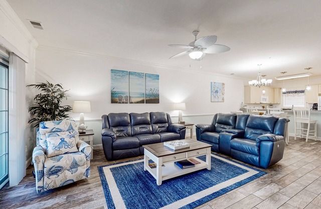 Dual-suite Magnolia Pointe condo with golf, pools, and screened patio