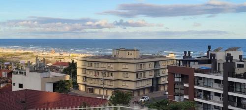 Dunas Flat 405 com vista mar, limpeza diária e roupas de cama e banho
