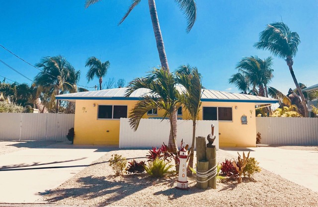 DUPLEX IN DUCK KEY, 2 Bedroom/2 Bath, W/Private 90' Dock, Trailer Storage INCL