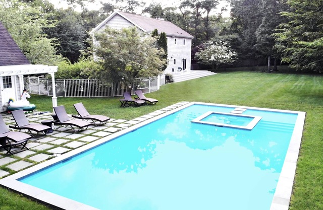 East Hampton Luxury: Heated Pool, Hot Tub and Expansive Yard with 6 Bedrooms