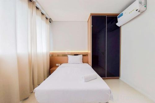 Elegant and Spacious 2BR at Paddington Heights Apartment By Travelio