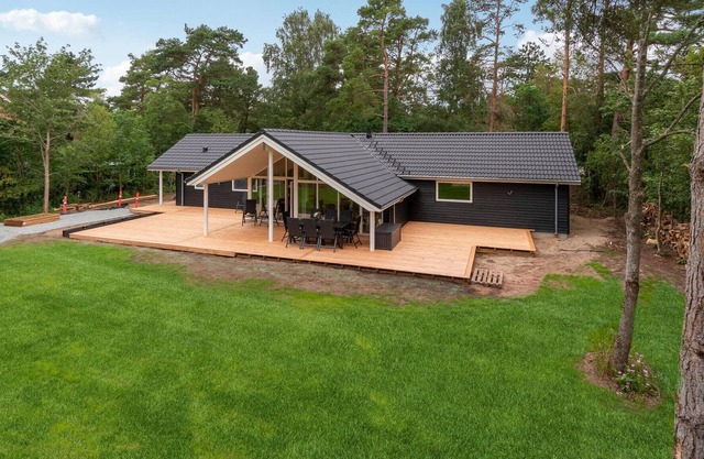 Enjoy a carefree time with the family in this comfortable vacation home with wellness.