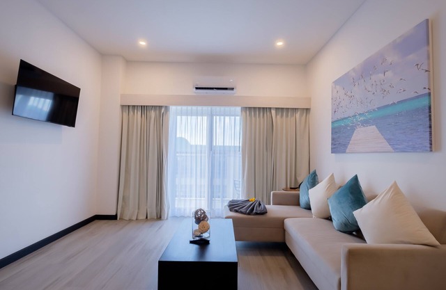 Enjoy a spacious signature two-bedroom suite with a beach view!