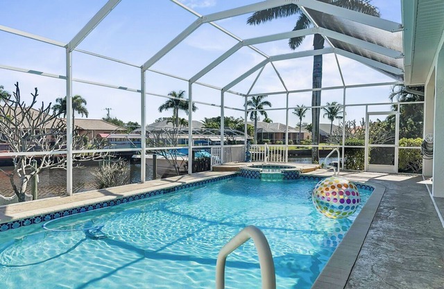 Entire home with pool, spa and game room on saltwater canal in Cape Coral, FL!