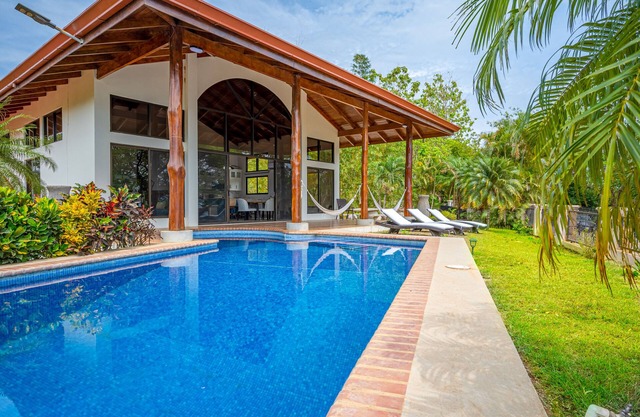 Exclusive tropical retreat with astonishing ocean views, pool, partial AC, & W/D