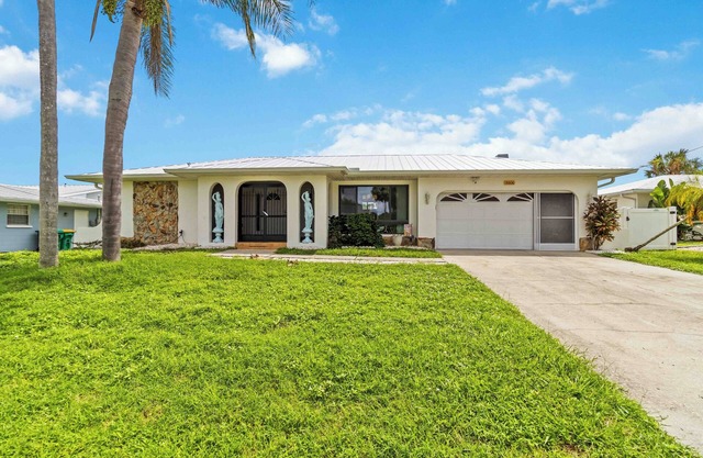 Experience serenity in this fully furnished 3-bed, 3-bath waterfront home featuring a heated pool, spacious layout, and abundant natural light. Enjoy stunning water views from the master suite, living room and Florida room.