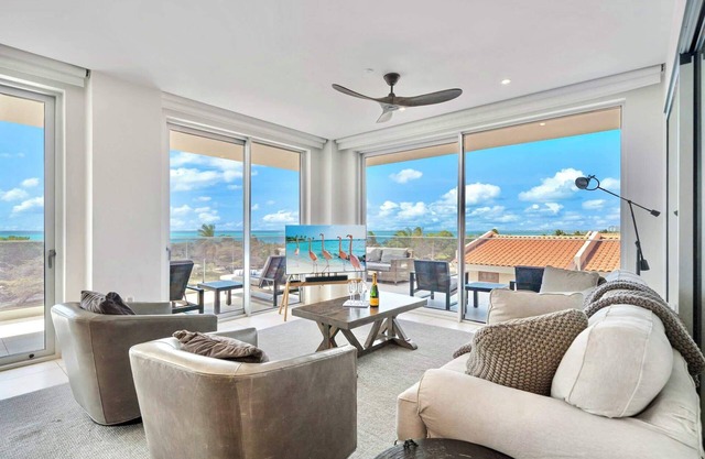 Exquisite Oceanfront Corner Condo. Unmatched Views & Luxurious Amenities