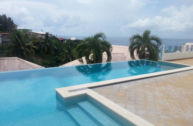F2 Panoramic view sea, mountain and swimming pool view of the residence