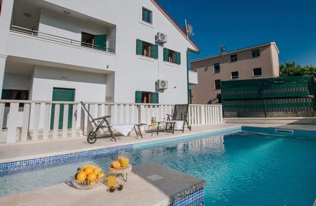 Family friendly house with a swimming pool Vrsine, Trogir (K-21602)
